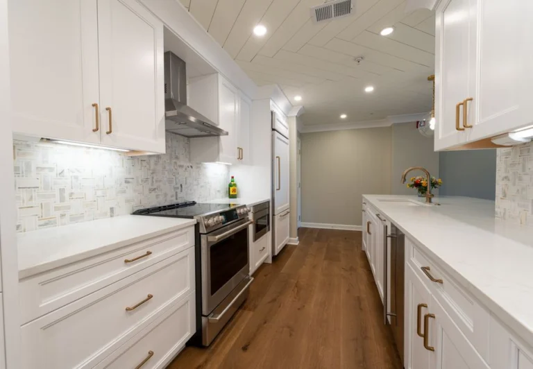 White kitchen with wood floors